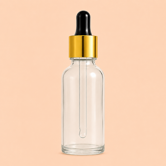 30ml clear glass dropper bottle with gold and black cap.