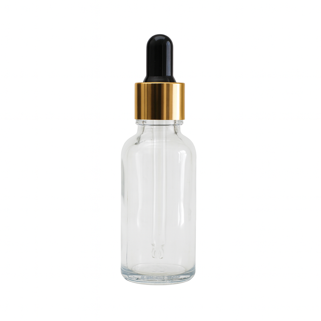 Clear glass dropper bottle with a gold cap 