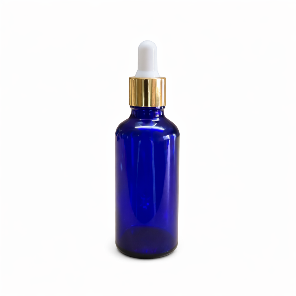 Blue glass dropper bottle with a gold cap 