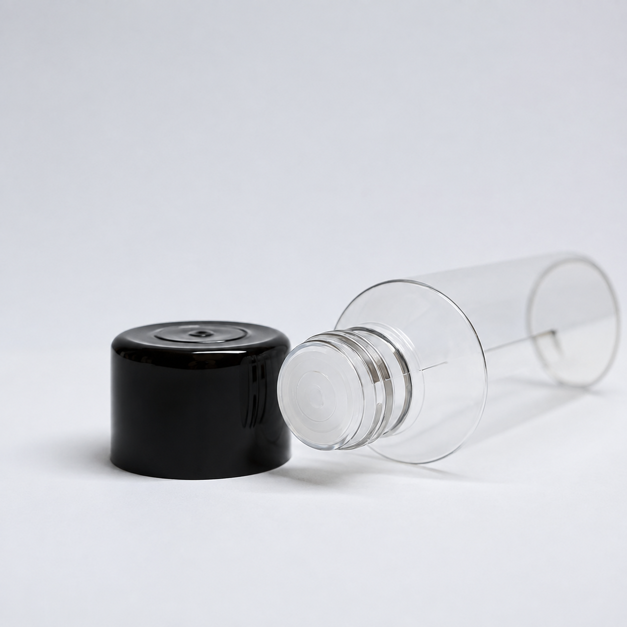 Tissue oil bottle with black lid.100ml